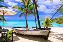 Beach restaurant with old boat, Mauritius island Beach restaurant with old boat, Mauritius island